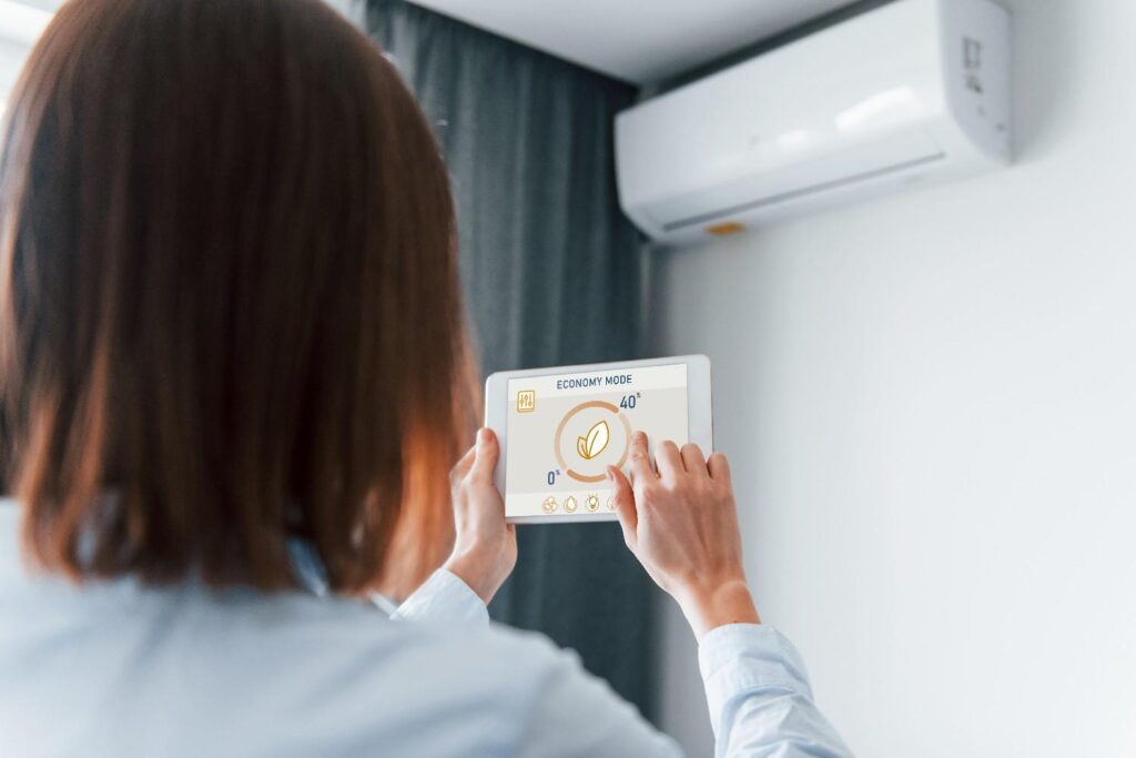 Modern best HVAC system installation showing high-efficiency central air unit with smart thermostat and Energy Star rating