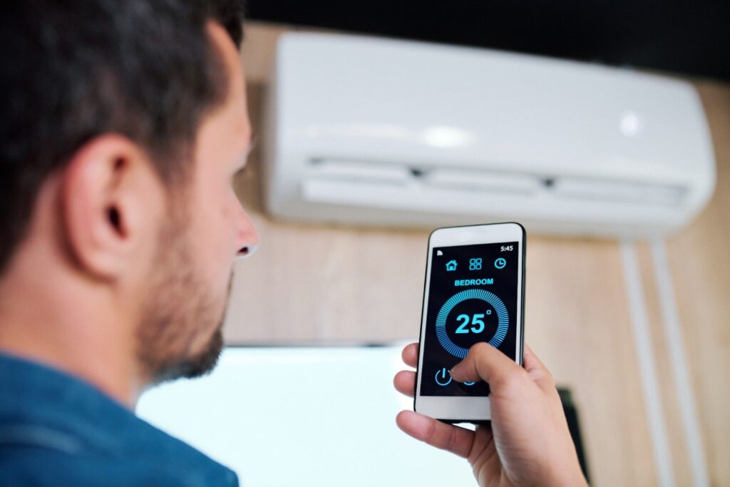 Ductless mini-split air conditioning unit mounted on the wall, representing the best flexible HVAC systems for zoned comfort.